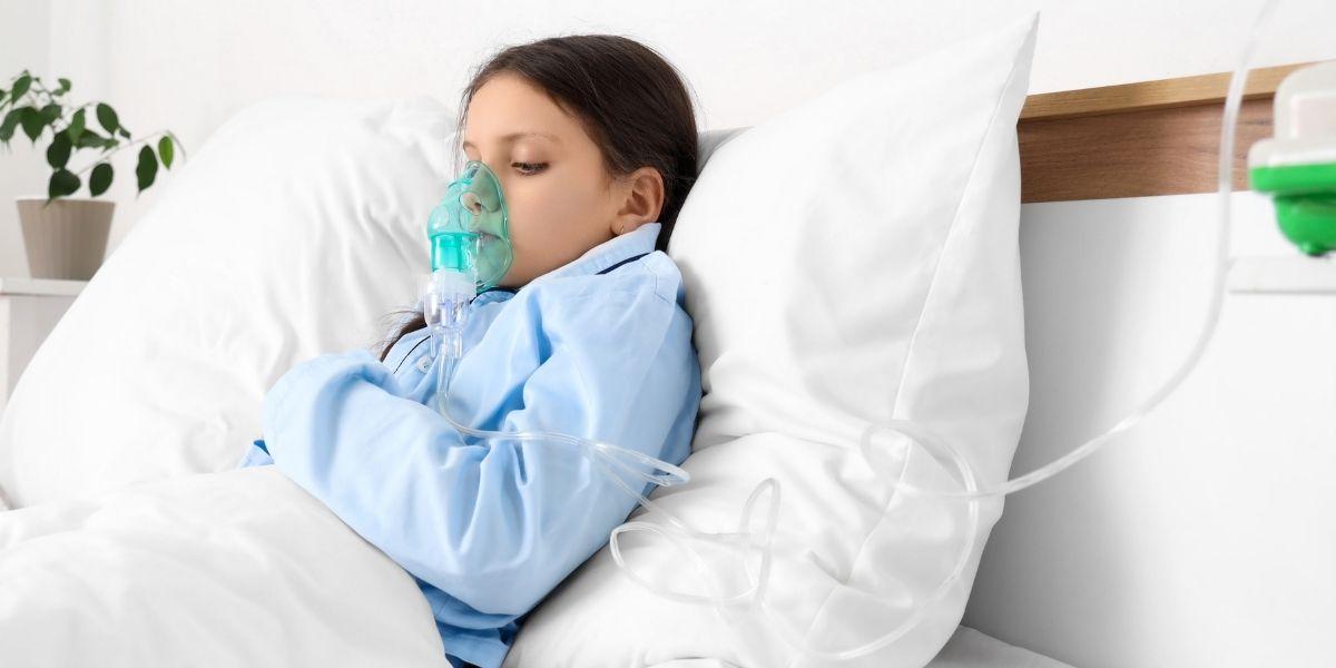 Pacient amb sistema de nebulització