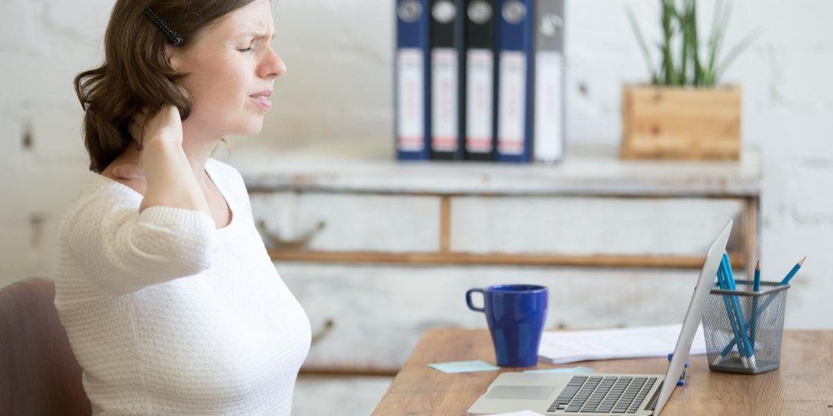 Dona amb mal d'esquena